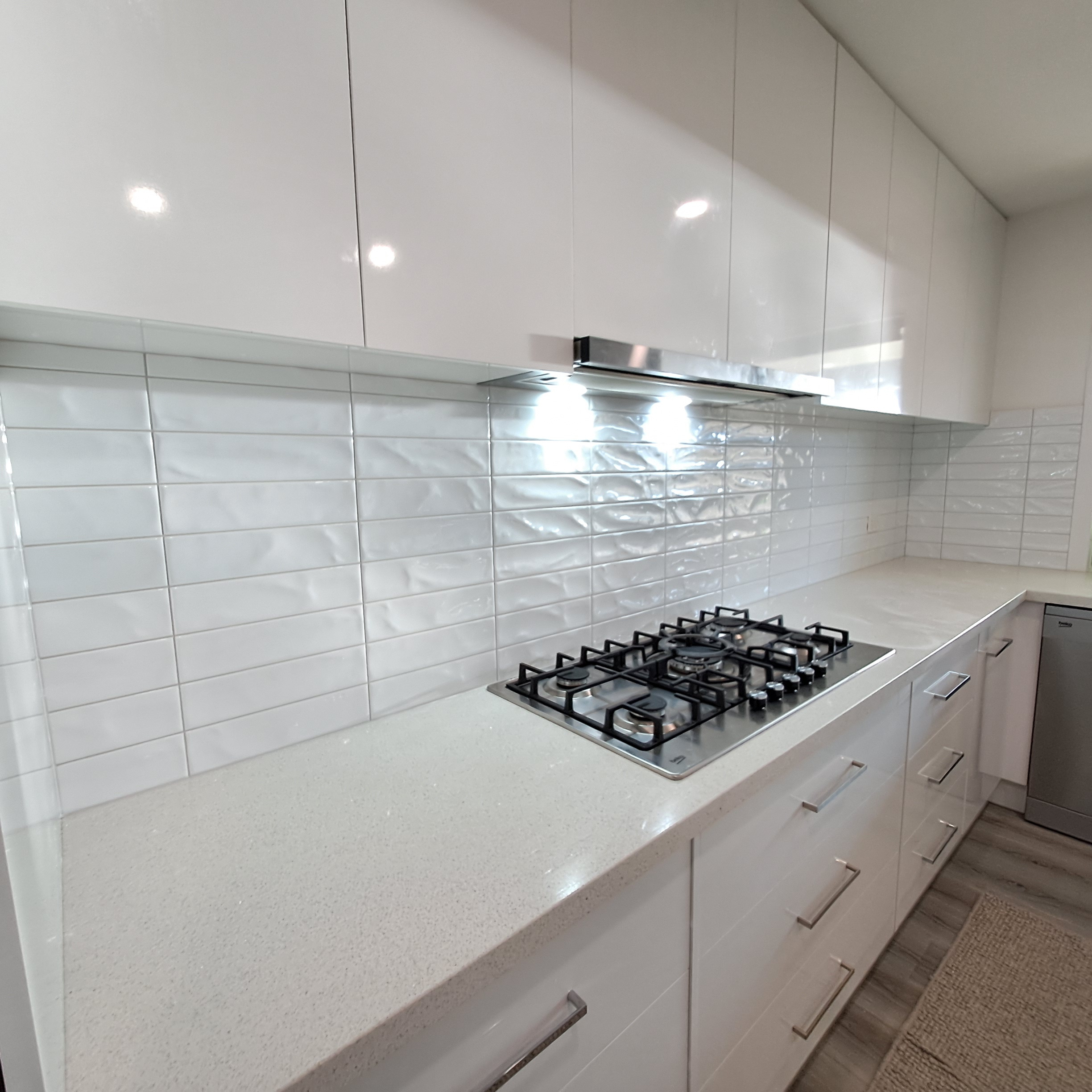 Contemporary bathroom renovation with feature tiles